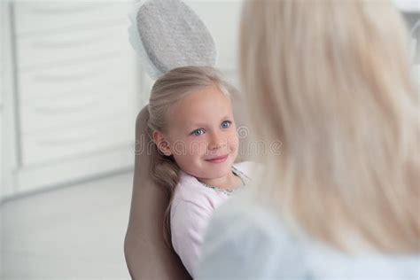 Cute Blonde Girl Waiting For The Examination At The Dentists Stock Image Image Of Healthcare