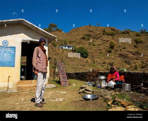 Indian Woman Washing Pans Near His House At The Outskirts Of Lamgara Village Kumaon Hills