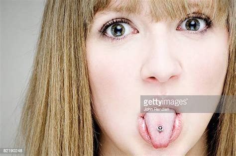 tongue piercing girl photos et images de collection getty images