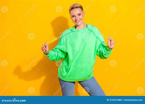 Photo Of Young Positive Relaxed Woman Wear Green Hoodie Stylish Outfit Play With Laces Advert