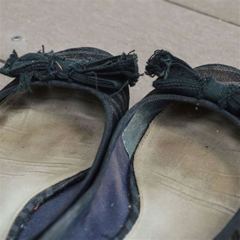 well worn ballet flats smelly with heavy foot marks shoe nirvana black canvas shoes ballet