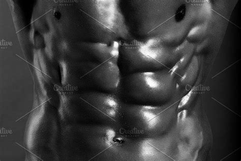 Strong Athletic Man Fitness Model Torso Showing Six Pack Abs Featuring