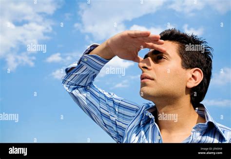 Guy Looking Up To The Sky Stock Photo Alamy