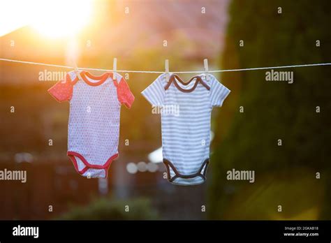 Baby Clothes Hanging On The Clothesline Stock Photo Alamy