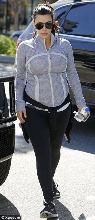 kim kardashian keeps her pregnancy curves under wraps as she heads to the gym daily mail online