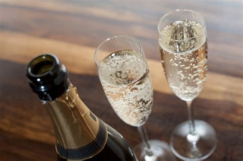 Maybe you would like to learn more about one of these? Open Champagne Bottle with Two Full Glasses - Free Stock Image