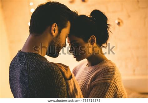 Passionate Romantic Couple In Sweaters Are Spending Time Together