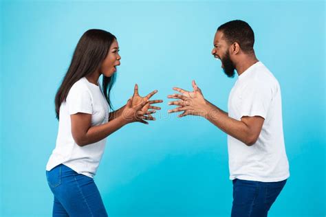 A Young Black Couple Arguing In A Restaurant Generative Ai Stock