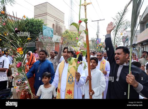 Catholic Christian Pilgrims March During The Palm Sunday Procession