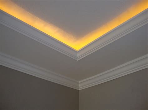 Led ribbons are truly a hidden treasure. Crown molding with rope lights... Going to do this next ...