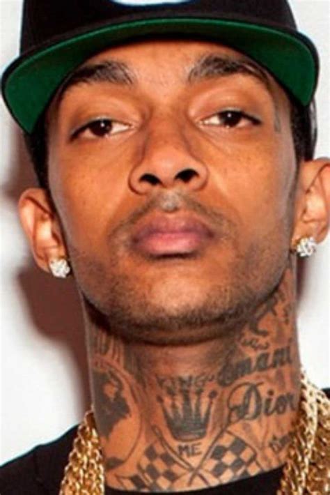 Nipsey hussle tattoo youtube nipsey hussle tattoos, 12 04 2019 lauren london tattoos just got a new addition a tattoo of nipsey hussle s face on her arm check it out below nipsey hussle s girlfriend lauren london has memorialised her longtime partner nipsey hussle forever in ink with a. Meanings behind Nipsey Hussle's Tattoos (New Images) - Also Celebrities with Nipsey Hussle ...
