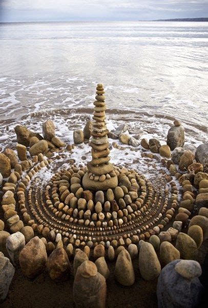 James Brunt Organizes Leaves And Rocks Into Elaborate Cairns And