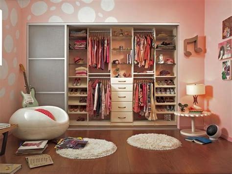 To replicate this look, make the wall that your closet doors are on a statement wall with colorful shiplap. Walk in closet design for girls | Hawk Haven