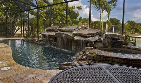 Siesta Key Pool Remodel With Stone Grotto Waterfall And Stone Spa