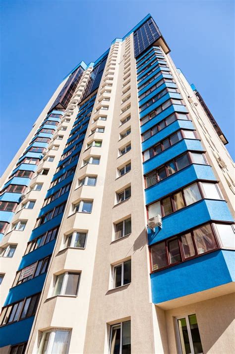 New Tall Apartment Buildings Against Blue Sky Background Editorial