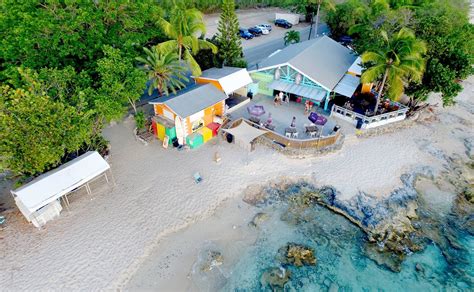 An Aerial View Of A House On The Beach
