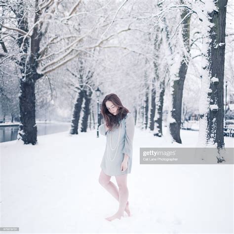 Barefoot Girl In Snow High Res Stock Photo Getty Images