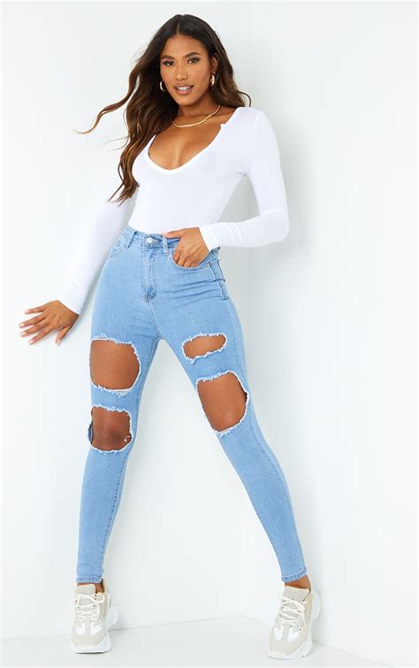 Light Wash Open Thigh Ripped Skinny Jeans Prettylittlething Aus