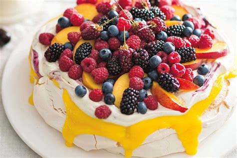 Christmas is just around the corner! Peach and raspberry pavlova - Recipes - delicious.com.au