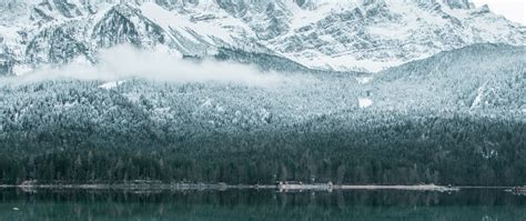 Mountain Reflection At An Icy Lake Hd Wallpaper 4k Ultra Hd Wide Tv