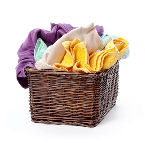 Premium Photo Clothes In A Laundry Wooden Basket Isolated