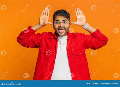 Funny Comical Indian Man Making Silly Facial Expressions Grimacing