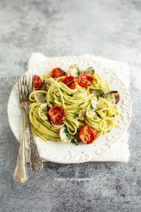 20 ml olio extravergine di oliva. Spaghetti con vongole veraci, cime di rapa e pomodorini ...
