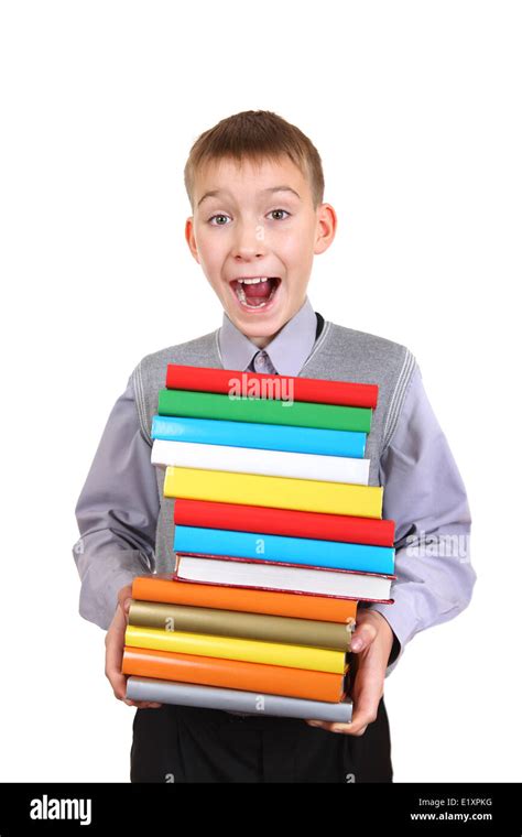Boy Holding Pile Of The Books Stock Photo Alamy