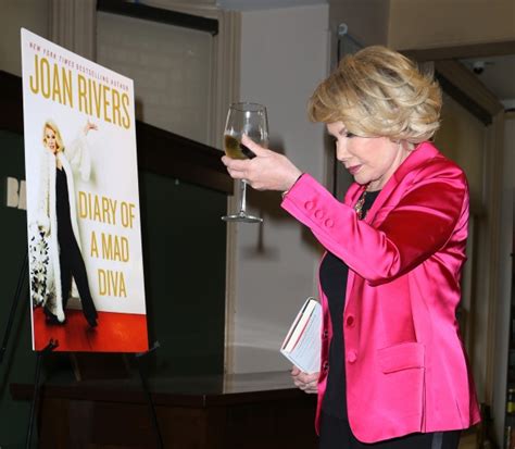 photos joan rivers signs copies of diary of a mad diva