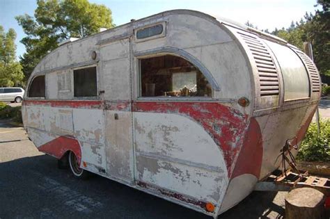 Whatever your rv needs, we're here to help. Unique Aero Flite vintage trailer parked in storage (With images) | Vintage campers trailers ...