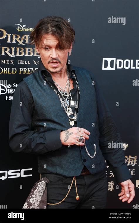 American Actor Johnny Depp Arrives On The Red Carpet For The Premiere
