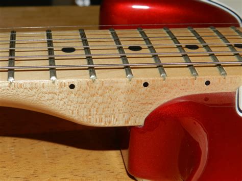 Is it okay to clean fretboard with lemon oil or is it harm my fretboard? Maple vs Rosewood Fretboard: What's the Difference and ...