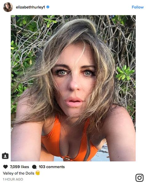 Elizabeth Hurley Flaunts Serious Cleavage As She Gives Fans An Eyeful