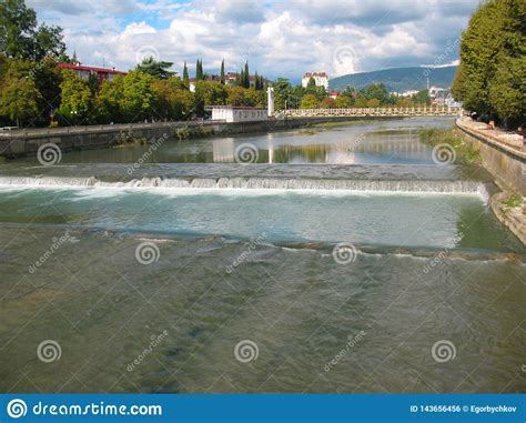 Sochi River With Small Water And Waterfall At Sunny Day Stock Photo