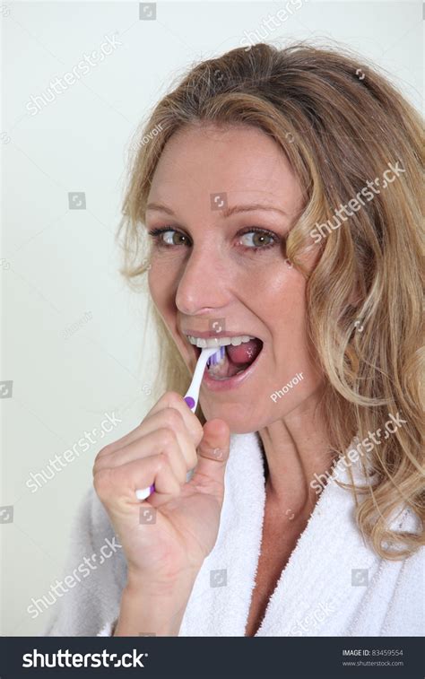 Woman Brushing Teeth Stock Photo Shutterstock