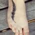 Stylized Ink Feather On Foot For Female Tattooimages Biz