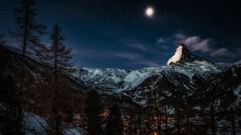 1366x768 Moon At Pick Of Winter Mountains 1366x768 Resolution Wallpaper
