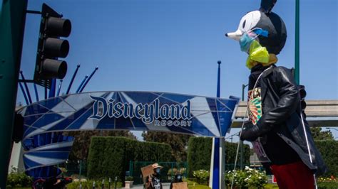 Disneyland Employees Protest Outside Shuttered Park Over Proposed Reopening Conditions The