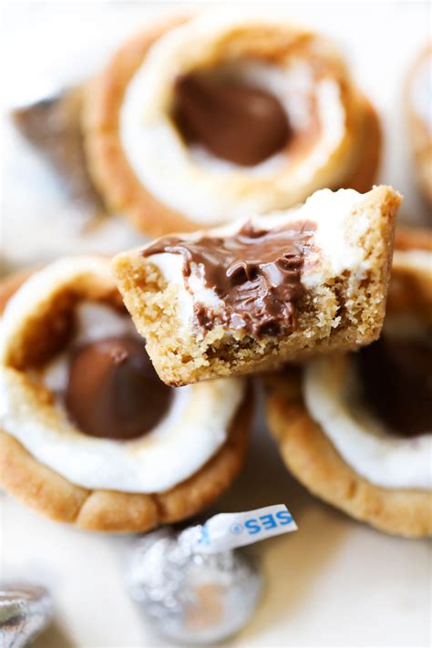 Hershey's kiss cookies are soft and chewy chocolate cookies topped with hershey kisses, ready in under 30 minutes! HERSHEY'S KISSES Peanut Butter Marshmallow Cookie Cups ...
