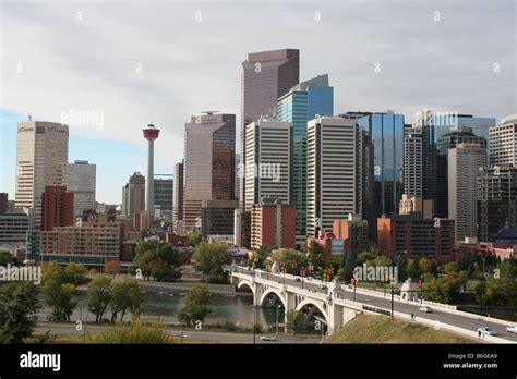 Calgary Tower And Calgary Skyline With Centre Street Bridge Over Bow