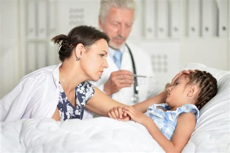 Portrait Of Sad Woman With Daughter In Hospital Ward Stock Image Image Of Medical Patient