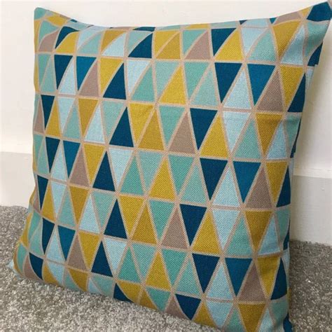 Teal Blue And Mustard Yellow Geometric Triangles Cushion
