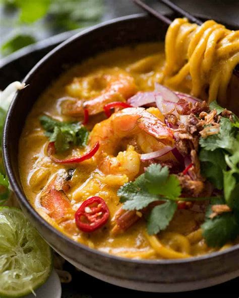 Serve with fresh thai basil, cilantro and lime juice. Amazing Easy Thai Coconut Soup | RecipeTin Eats