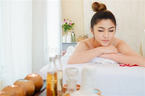 Young Women Relaxing In Spa Massage Lie On Your Stomach On The Bed Stock Image Image Of Adult