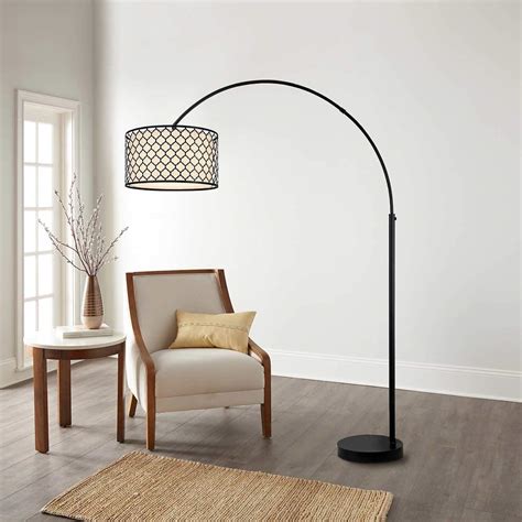 A floor lamp with shelves checks both of those things off the list while also providing storage to display photos and home accents. Athena Arc Floor Lamp - Walmart.com - Walmart.com