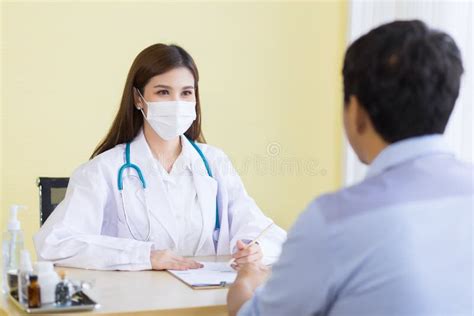 Asian Female Doctor Asking Patient Questions Stock Photo Image Of