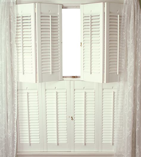 Notice the collection of shells in the lighted bookcase. Indoor Window Shutters Do It Yourself | TcWorks.Org