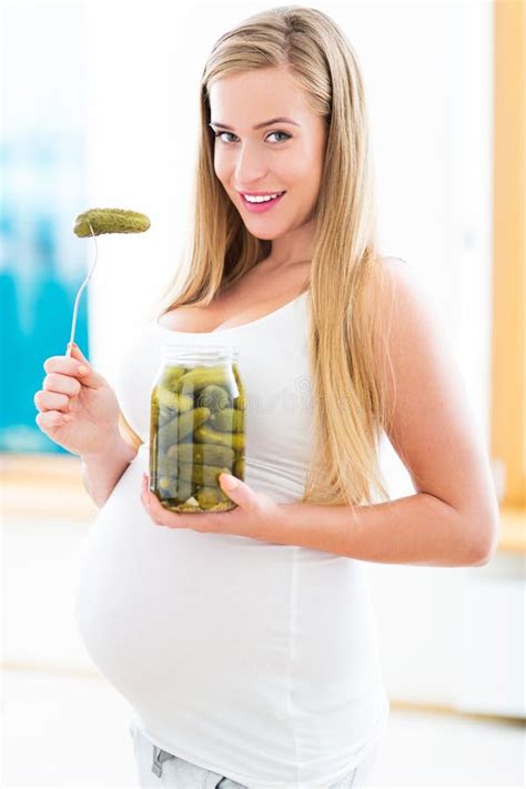 pregnant woman eating pickles stock image image of bowl belly 44069471
