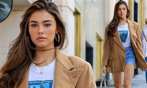 Madison Beer Flaunts Her Toned Legs While Wearing A Chic Brown Blazer With Denim Shorts For