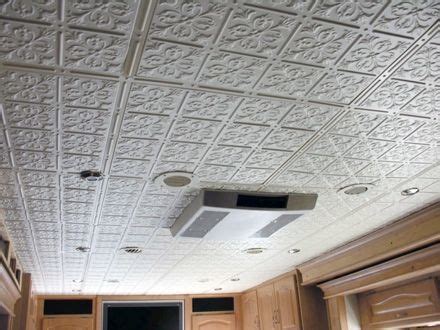 Nail up, drop in suspension grid, snaplock and glue up. Glue-up ceiling tiles - look like tin. | Popup camper, Pop ...